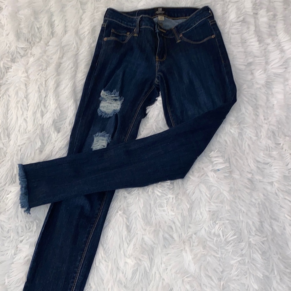 Jeans; ripped with fringe detail